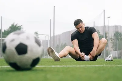 Soccer Player suffering from foot injuries