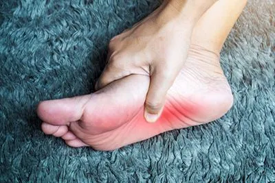 Person with Plantar Fasciitis condition