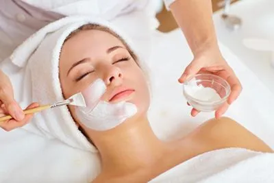 Chemical Peel on face of a flawless woman