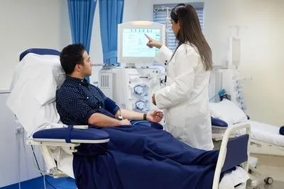 Male patient in dialysis procedure on clinic