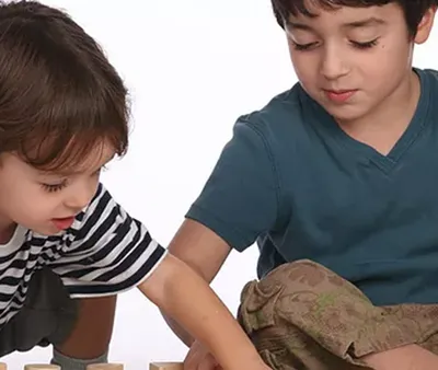 2 young boys playing