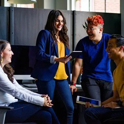 people chatting in office