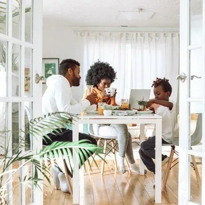 family at table together