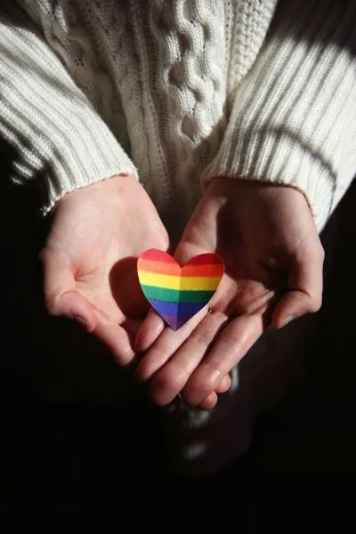 lgbtq heart in hands