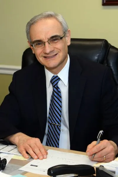 Dr. Bendetowicz at his desk