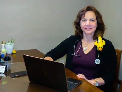 Dr Wolken with her laptop