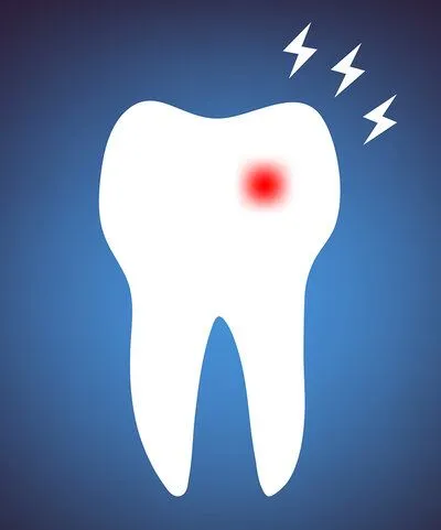 graphic of tooth with red spot on it indicating pain, tooth aches Old Bridge, NJ emergency dentist