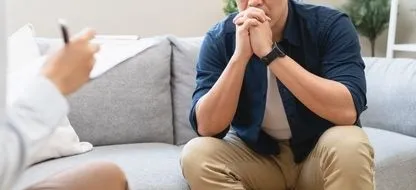 Man talking to a therapist