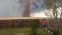 mowing the lawn during a tornado