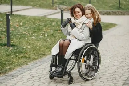 parent in wheelchair with their child