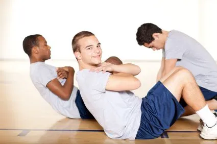 man stretching on the basketball court