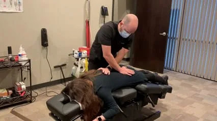 mccoy explaining the gentle chiropractic technique using flexion table