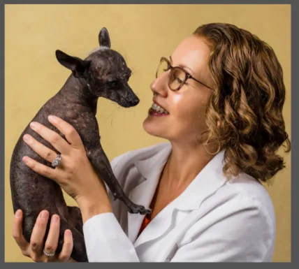 Dr. Edelle and Pearl, her senior Mexican Hairless dog.