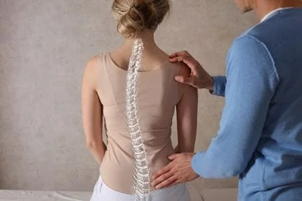 Women having spine examined