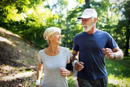 Happy older couple walking