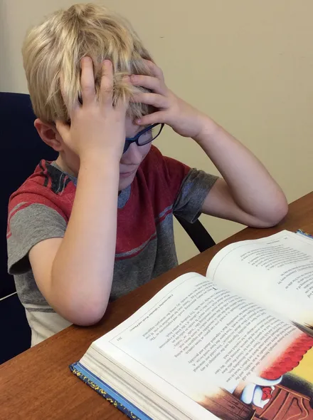 Young boy doing vision therapy