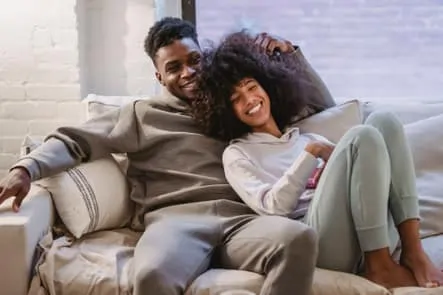 black couple on couch