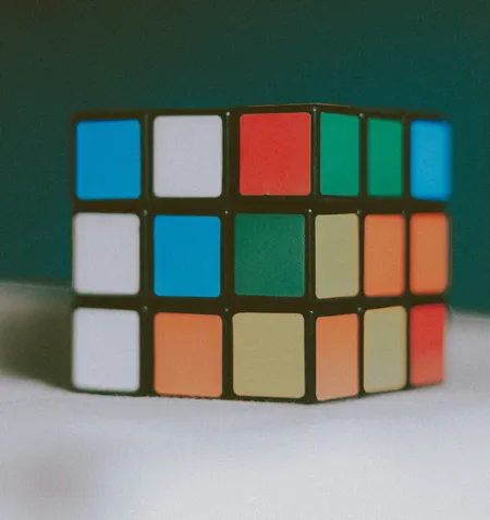 Person sitting in front of an audio mixer