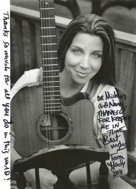 Image of woman with guitar