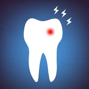 graphic of tooth with red spot on it indicating pain, needs emergency dental care, dentist Salem, Oregon