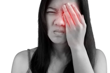 woman suffering from a common eye injury