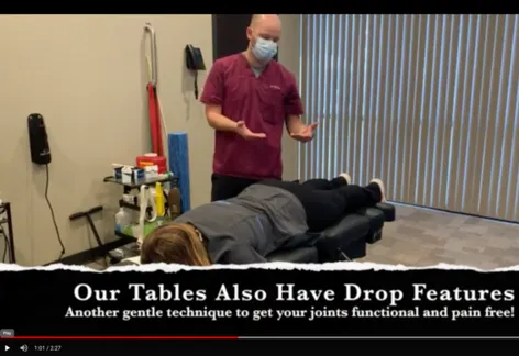 Dr McCoy explaining drop table gentle chiropractic technique