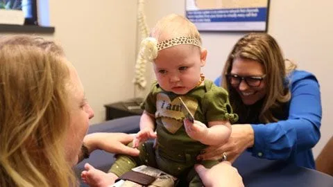 Chiropractor Treating an Infant