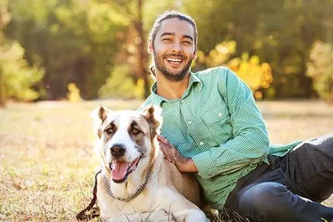 MALE WITH LARGE DOG