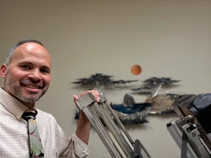 Dr. Yamamoto with adjustment equipment