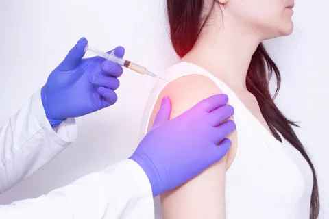 Female getting cellular solution & regenerative medicine therapy in shoulder