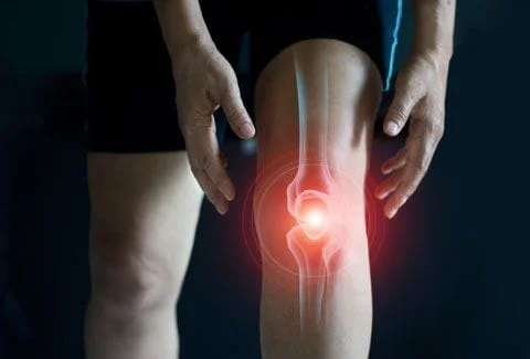 Person's knee showing pain in the area