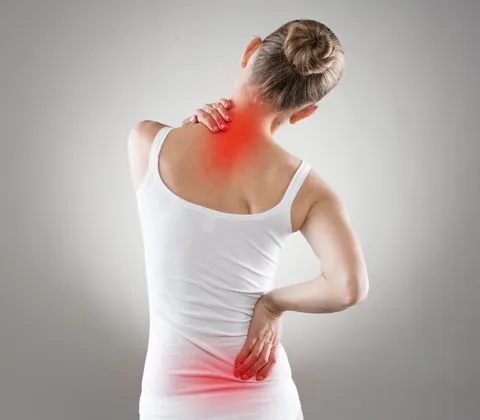 Women with pain points on back