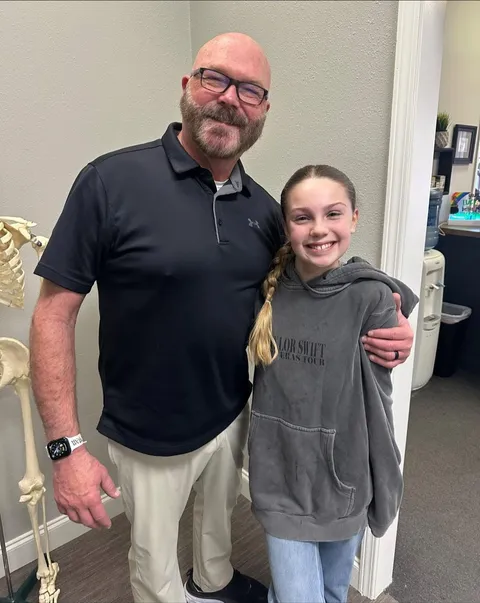 Dr. McDaniel with a young athlete patient