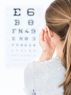 image of woman doing an eye test. 