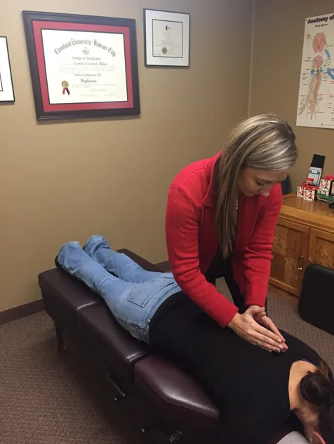 Dr. Cait performing adjustment