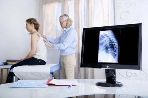 Patient receiving a spinal screening
