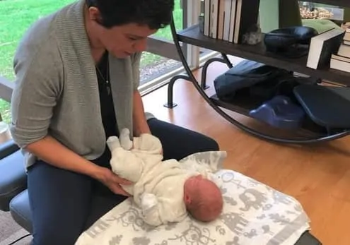 baby receiving chiropractic care