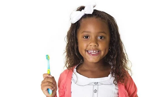 child_with_toothbrush