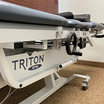 Non-surgical spinal decompression