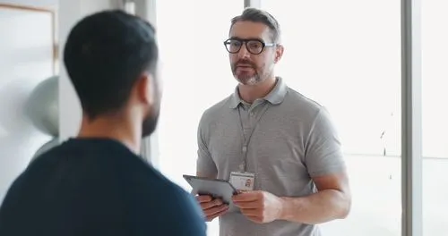 Patient-Talks-With-Chiropractor