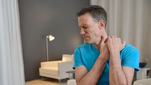 man with shoulder pain