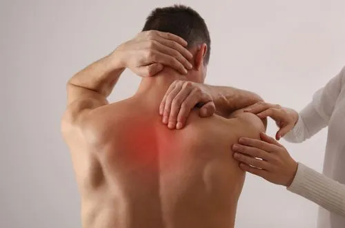 man with upper back pain