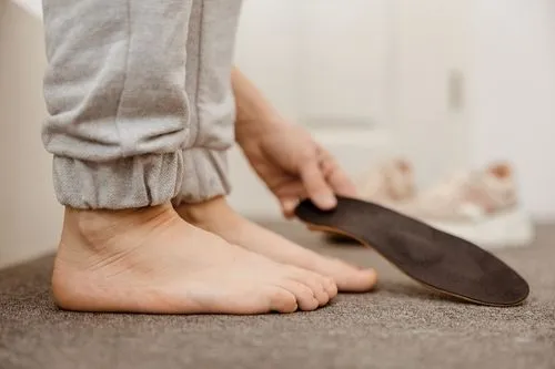 Custom orthotics designed to support flat feet and improve foot alignment
