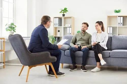 Therapist supporting partners in relationship session