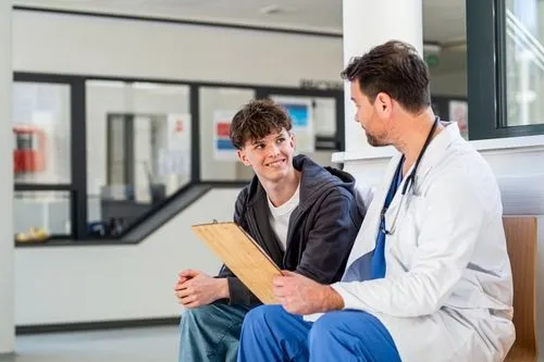 Teen with pediatrician during consultation