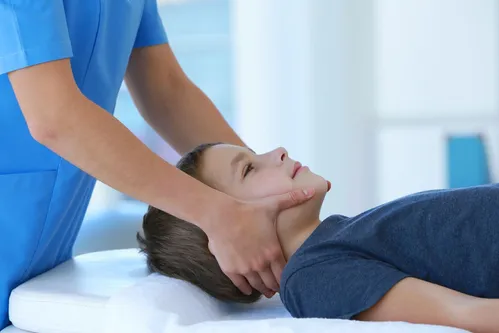 young patient being adjusted