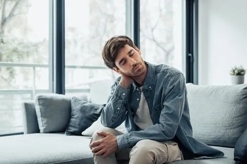 man with neck pain