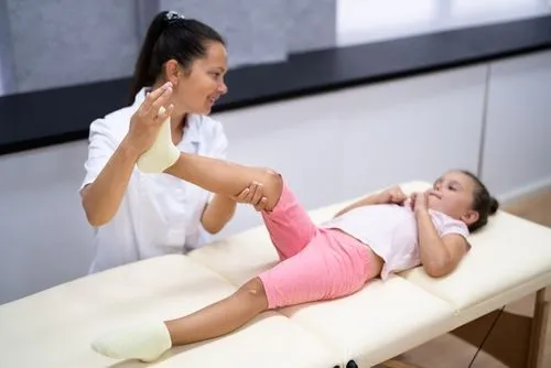 Child receiving a chiropractic adjustment from a pediatric chiropractor