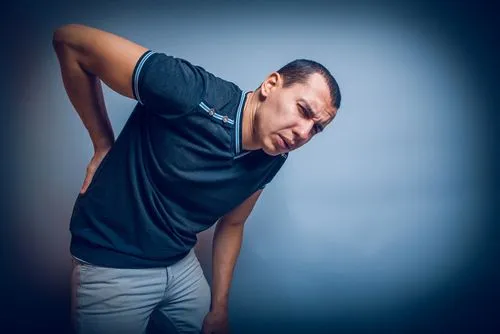 man with lower back pain