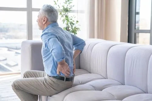 old man with back pain